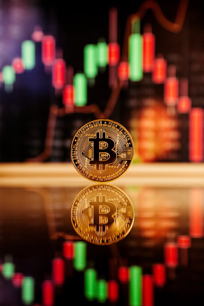 about-img-01 Golden Bitcoin standing in front of a financial chart, reflecting the cryptocurrency market volatility.